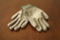 Close-Up of Cut-Resistant Gloves on Wooden Table