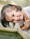 Close up of cute Asian child girl is smiling