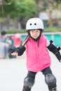 Girl play roller skating Royalty Free Stock Photo