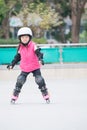 Girl play roller skating Royalty Free Stock Photo