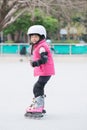 Girl play roller skating Royalty Free Stock Photo