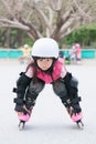 Girl play roller skating Royalty Free Stock Photo