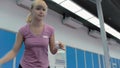 Close-up: cute girl playing the table tennis at the court