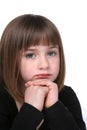 Close up of cute girl's sad or thoughtful face