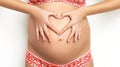 Close up of a cute pregnant belly with heart. waiting Girl Royalty Free Stock Photo