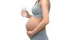 Close up of a cute pregnant belly woman with a glass of water. I Royalty Free Stock Photo