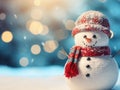 Close-up of a cute toy snowman in a red hat and scarf on a snowy background on a blurred bokeh background in winter Royalty Free Stock Photo