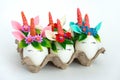 cute unusual Easter white unicorn eggs on a white background