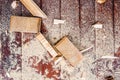 Close up of cutters of wood lying among sawdust Royalty Free Stock Photo