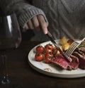 Close up of a cutting a fillet steak food photography recipe idea