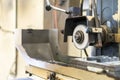 Close up cutting or grinding wheel during rotating or working with product on high accuracy and automatic surface horizontal