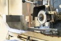 Close up cutting or grinding wheel during rotating or working with product on high accuracy and automatic surface horizontal