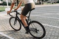 Close up of cyclist biking outdoors during summer time