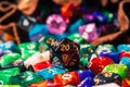 Close-up of a d20 on a pile of dice