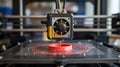 Close-up of 3D printer creating an object with pink filament. Modern additive manufacturing and technology concept Royalty Free Stock Photo