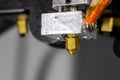 Close-up of a 3D printer printhead, hotend and extruder from a 3D printer Royalty Free Stock Photo