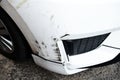 Damaged scratching on the front of the white car Royalty Free Stock Photo