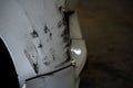 Damaged scratching on the front of the white car Royalty Free Stock Photo
