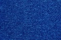 Close up of dark blue color carpet texture background with seamless pattern Royalty Free Stock Photo