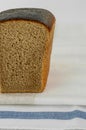 Close-up of dark bread. Half a bread brick. Royalty Free Stock Photo
