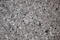 Close-up of dark gray granite interspersed with black and white Royalty Free Stock Photo