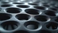 Close up of dark gray honeycomb structure with circular openings. Textured surface repeats in grid pattern. Futuristic abstract Royalty Free Stock Photo