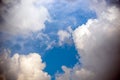 CLOSE UP: Dark grey stormy clouds gather above Lake Maggiore on a calm summer evening. Dramatic shot of clouds covering up the Royalty Free Stock Photo