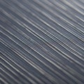 Close-up of dark, metallic strands with a linear pattern, possibly resembling fine wires o Royalty Free Stock Photo
