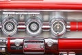 Close up at a dashboard with a radio in a vintage car Royalty Free Stock Photo