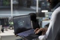Close up of data center engineer using laptop to implement AI virtualization Royalty Free Stock Photo