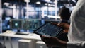 Close up of data center programmer using tablet, writing code Royalty Free Stock Photo