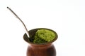 Closeup of an old gourd with yerba mate and stainless steel pump used to prepare chimarrÃÂ£o, traditional in southern Brazil. Royalty Free Stock Photo