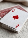 Close-up of a deck of playing cards with the ace of hearts on top. Royalty Free Stock Photo