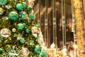 Close up decorated Christmas tree on blurred background in midnight green theme / New Year Holidays/ bokeh effect / copy space Royalty Free Stock Photo