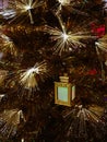 Close up of decorated christmas tree with golden led lights Royalty Free Stock Photo