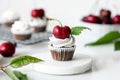 A close up of a decorated muffin on a plate