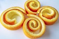Decorative orange peels on white plate Royalty Free Stock Photo