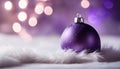 Close up of decorative purple baubles on white fur. Royalty Free Stock Photo