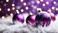 Close up of decorative purple baubles on white fur. Royalty Free Stock Photo