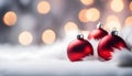 Close up of decorative red baubles on white fur.