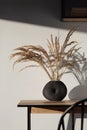 Decorative vase with dried grass