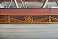 Close-up of decorative wooden decorations with gilding of the side of the Sultan\'s galley