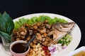 Close up Deep Fried Snapper Served with. Mixed of Thai Herb and Special Sauce. Call Thai name is Miang. Seletive Focus