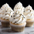 Close-up Delicious appetizing cupcakes with vanilla cream