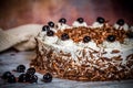 Close-up of the delicious chocolate cream cake white cherry