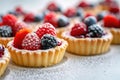 Fresh Berry Tartlets on Table, Gourmet Dessert Concept
