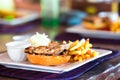 Close up of delicious fresh burger with cheese and bacon Royalty Free Stock Photo