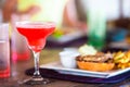 Close up of delicious fresh burger with tasty cocktail Royalty Free Stock Photo