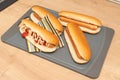 Close-up of delicious hotdogs on tray as fast food concept