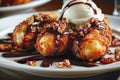 Close up of Delicious Ice Cream Topped Fried Banana with Syrup and Chopped Nuts Dessert Plate